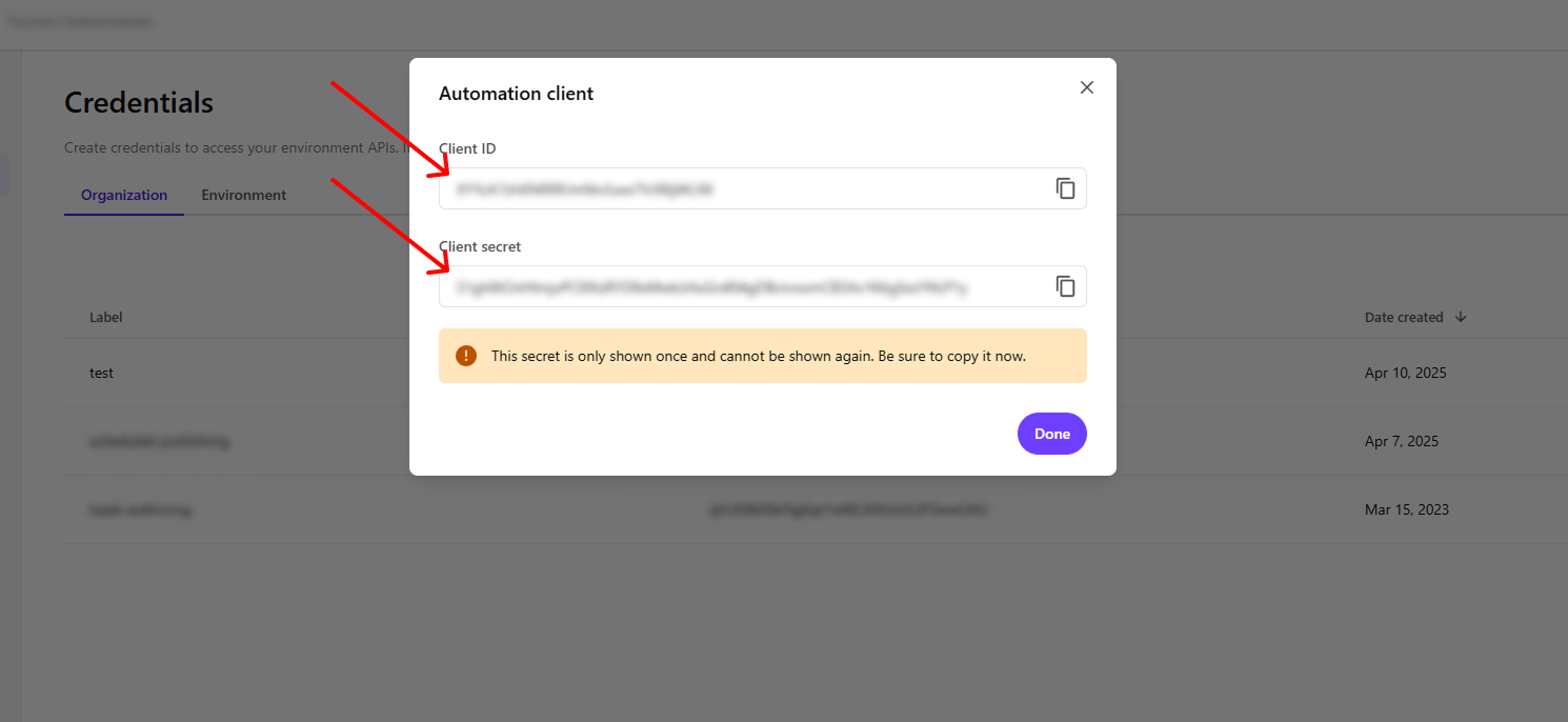Popup showing generated Client ID and one-time Client Secret in XM Cloud Deploy, with red arrows pointing to each field