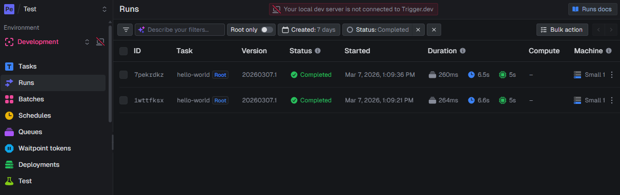 Trigger.dev Runs dashboard in Development environment showing two completed hello-world jobs, with columns for Task, Version, Status, Started time, Duration, Compute, and Machine